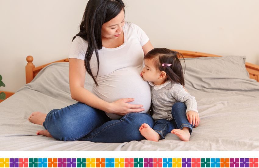 Pregnant woman and older child