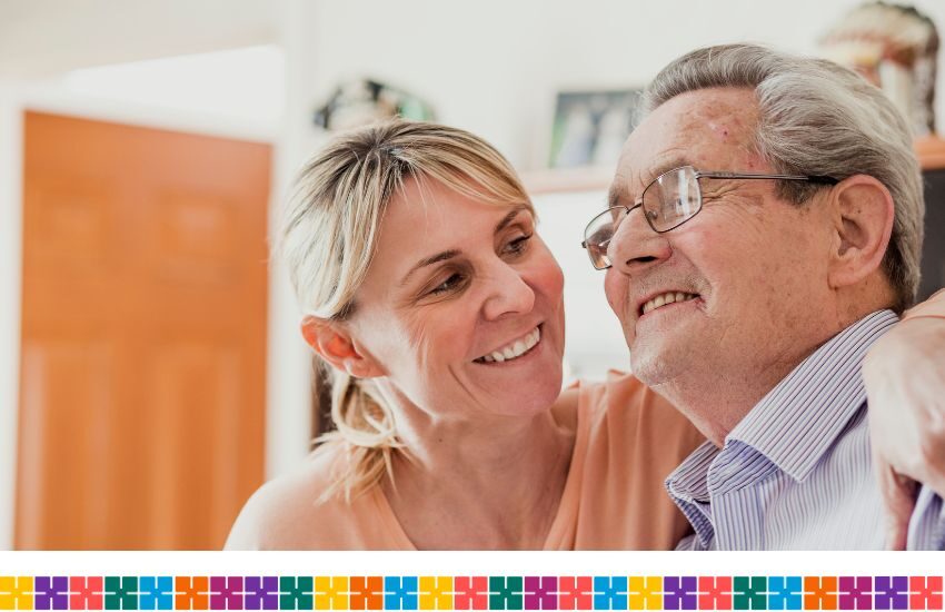 Older woman caring for male family member